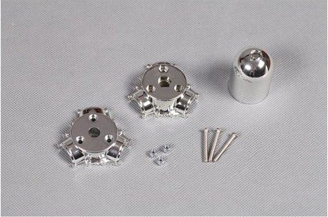 Silver RC model engine parts including a spinner and mounting hardware