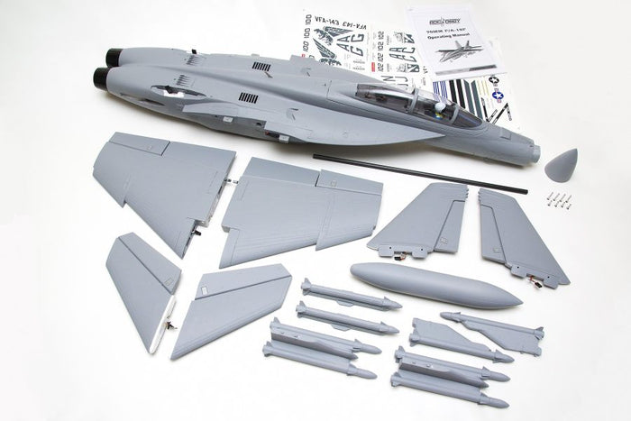 FMS 70mm F-18F V2 PNP model jet kit components, including fuselage, wings, tail fins, and missiles, with decals and manual.