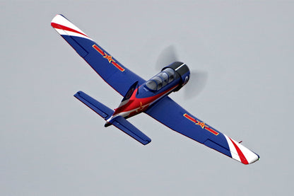 FMS 1200mm CJ-6 PNP model airplane with blue, red, and white PLAAF livery in flight