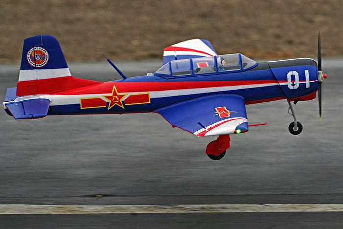 FMS 1200mm CJ-6 V2 PNP airplane, blue red white trim, gold star decal, with landing gear extended.