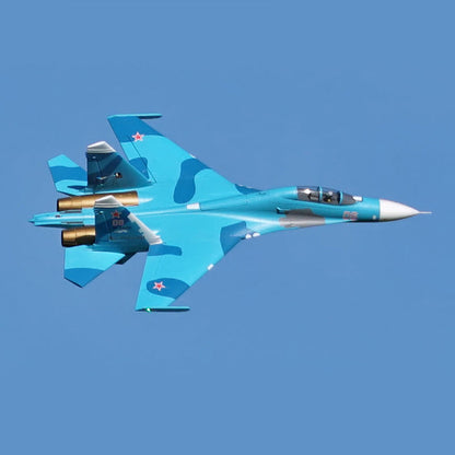 FMS Dual 70mm EDF SU-27 / J-11 PNP jet fighter in flight with blue camouflage.