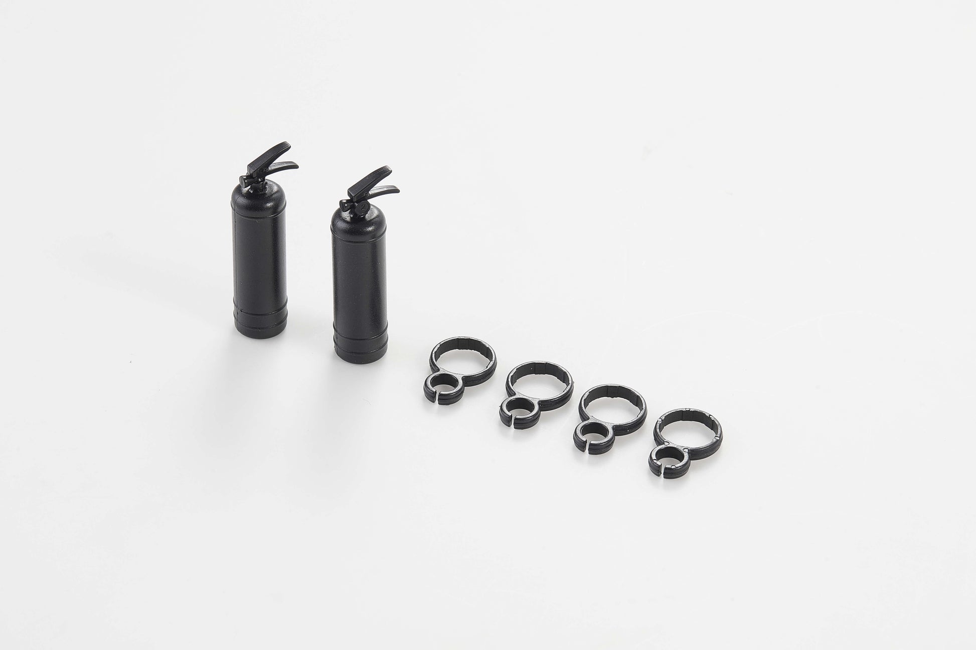 1:10 scale fire extinguishers for RC models with mounting rings.