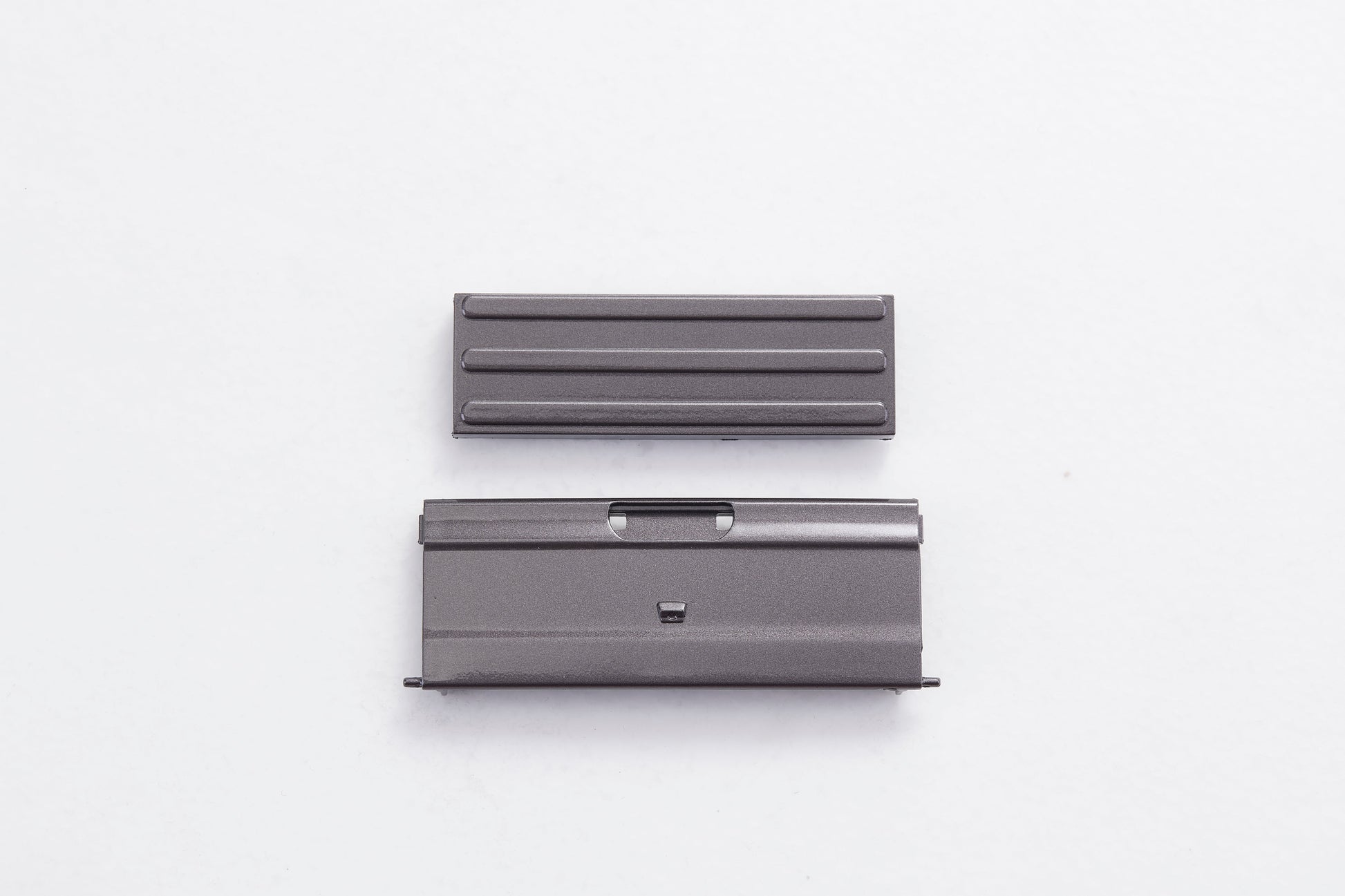 1/18 Cheyenne rear door components: metal, grooved panel, slotted base with latch.