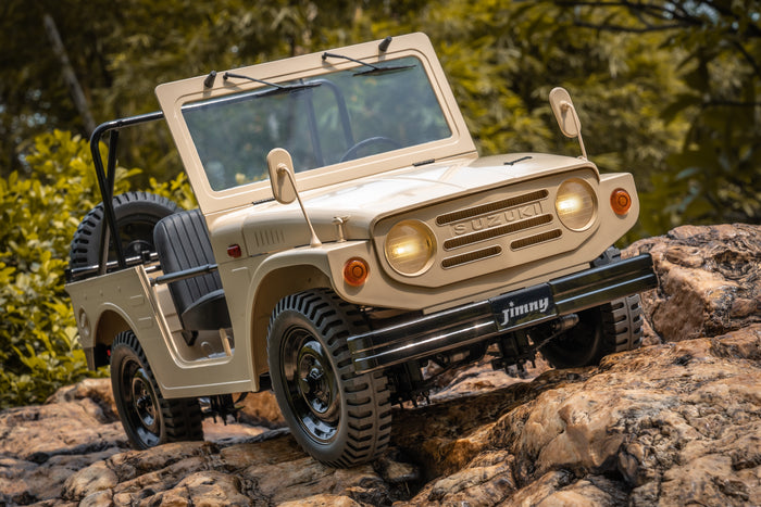 FMS 1:6 Jimny RS Brown RC vehicle climbing rocks