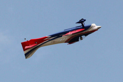 FMS 1400mm F3A Olympus PNP aerobatic RC airplane in blue, white, and red, flying against a blue sky.