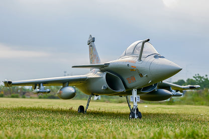 FMS 64mm Rafale PNP RC jet with gray camouflage livery and orange markings '30-HW' on a grassy field.