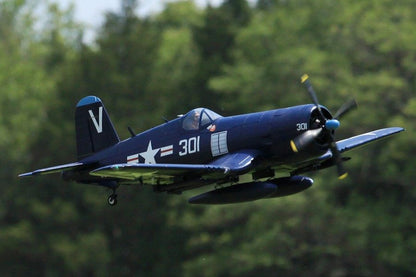 FMS 1400mm blue F4U Corsair RC plane in flight, featuring scale details like retracting landing gear and pilot figure.