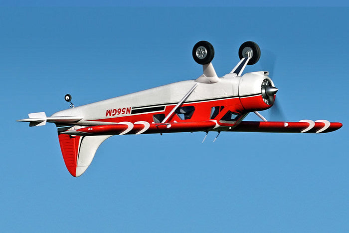 FMS 2000mm Beaver V2 seaplane in red and white flying upside down, with N56GM registration.