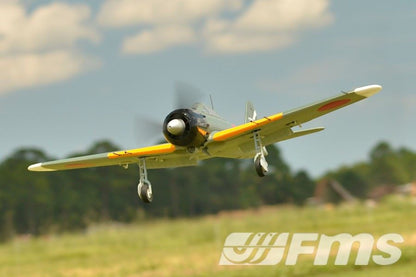 FMS 1100mm A6M5 Zero PNP model airplane in flight, featuring scale details and yellow wing accents.
