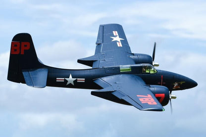 FMS 1700mm F7F Tigercat PNP model airplane in blue with red markings, flying in the sky.
