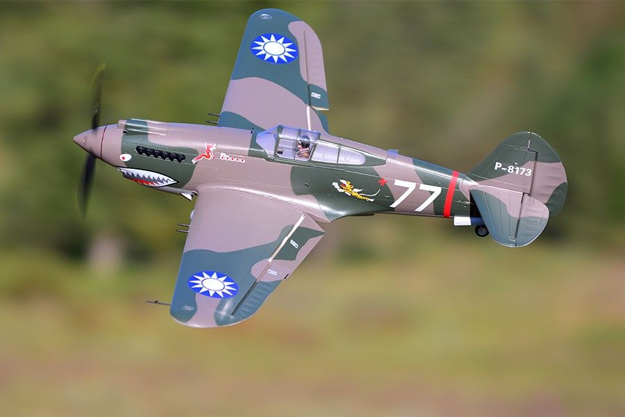FMS 980mm P-40B Flying Tiger aircraft with shark mouth decal and '77' on fuselage