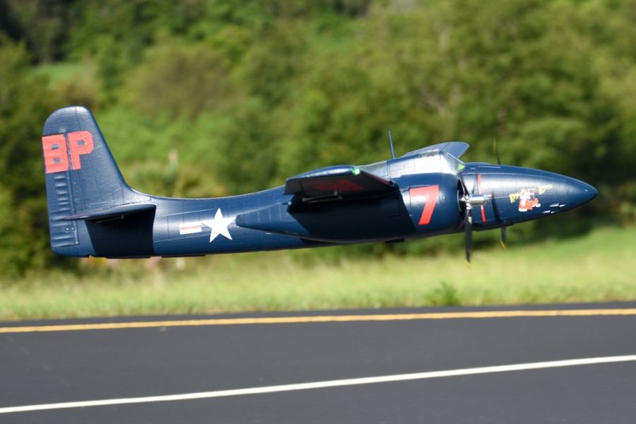FMS 1700mm F7F Tigercat blue model aircraft in flight, featuring a prominent number 7 and BP on the tail.
