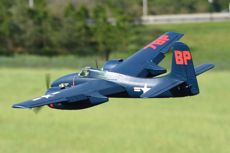 FMS 1700mm F7F Tigercat blue model airplane flying with red '7BP' markings.