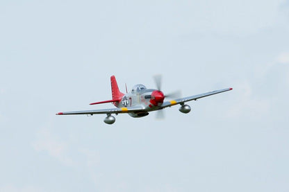 FMS 1700mm P-51D Red Tail PNP model aircraft in flight, silver with red accents and markings.