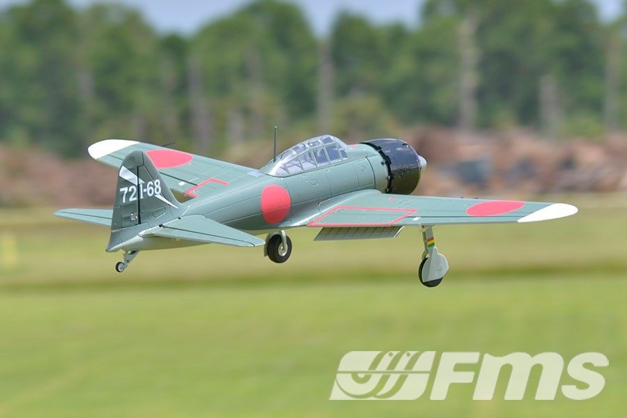 FMS 1100mm A6M5 Zero PNP RC warbird in flight, featuring scale details and red Hinomaru markings.